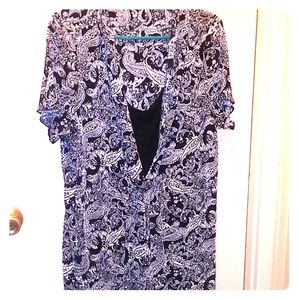 Blouse with attached inside shirt.